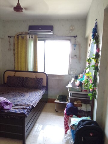 Living Room in 2 BHK Apartment at Divya Srushti CHS, Kandivali West – for Rent