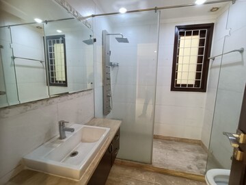 Bathroom in 4 BHK Builder Floor at Green Park – for Sale