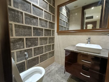 Bathroom in 4 BHK Builder Floor at Green Park – for Sale