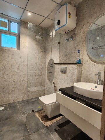 Bathroom in 4 BHK Apartment at Fortune Victoria Heights, Dhakoli Village – for Sale