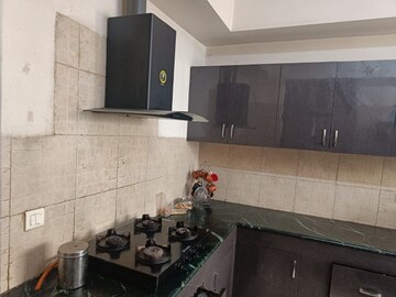 Kitchen in 3 BHK Apartment at Puri Pranayam, Sector 82 – for Sale