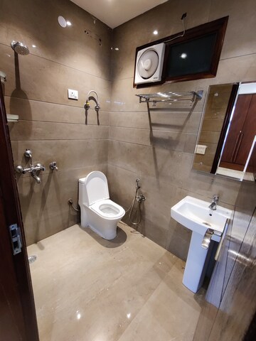Bathroom in 4 BHK Apartment at Paschim Vihar – for Sale