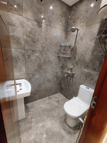 Bathroom in 4 BHK Apartment at Paschim Vihar – for Sale