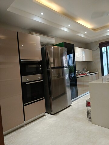 Kitchen in 5 BHK Builder Floor at Auram Floor, South City 2 – for Sale