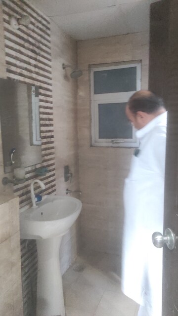 Bathroom in 3 BHK Apartment at Sarvottam KSN Coziome, Vasundhara Sector 3 – for Sale