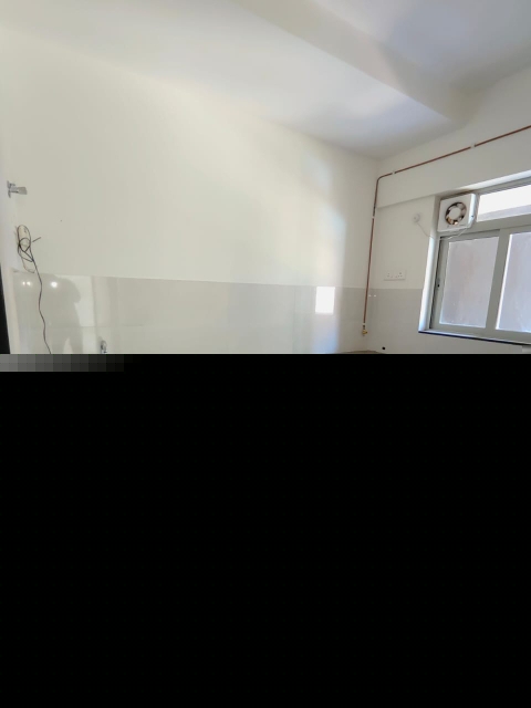 Master Bedroom in 1 BHK Apartment at Ashar Metro Towers, Vartak Nagar – for Sale