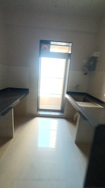 Bathroom in 2 BHK Apartment at Acme Ozone, Manpada – for Sale