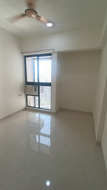 Room in 2 BHK Apartment at Acme Ozone, Manpada – for Sale