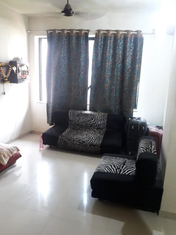 Living Room in 1 BHK Apartment at Vasant Sagar, Kandivali East – for Sale