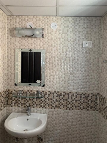 Bathroom in 2 BHK Apartment at SCC Blossom, Raj Nagar Extension – for Sale