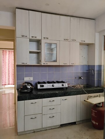 Kitchen in 2 BHK Apartment at ROF Aalayas, Sector 102 – for Sale