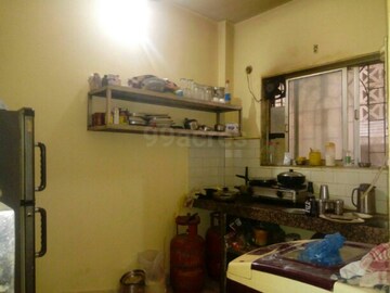 Kitchen in 1 BHK Apartment at Shivkala CHS, Vasai East – for Sale