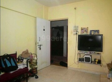Living Room in 1 BHK Apartment at Shivkala CHS, Vasai East – for Sale