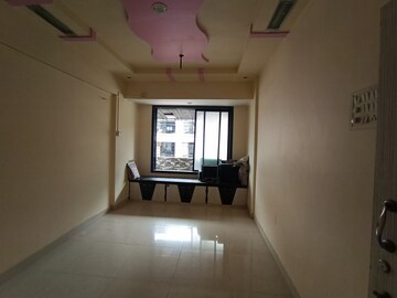 Living Room in 2 BHK Apartment at Kopar Khairane – for Sale