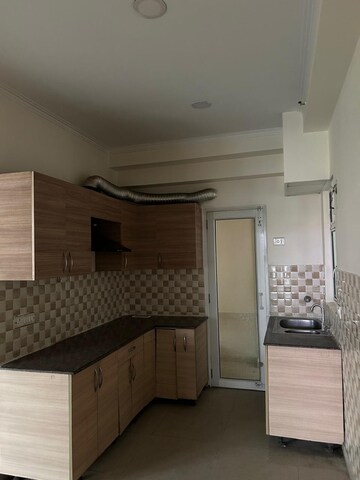 Kitchen in 3 BHK Apartment at Gaur City 2 - 16th Avenue, Sector 16c Greater Noida – for Sale