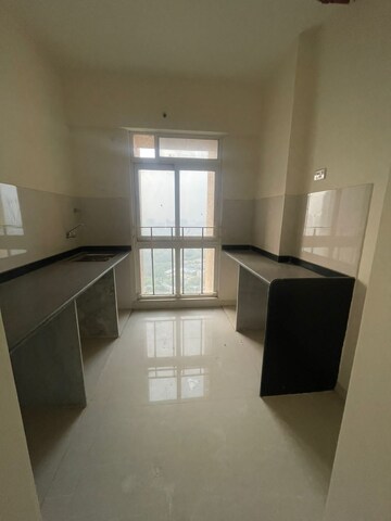 Kitchen in 2.5 BHK Apartment at Vijay Orovia, Ghodbunder Road – for Sale