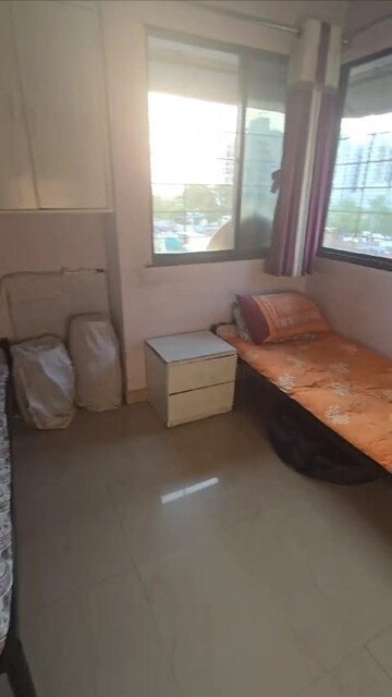 Living Room in 2 BHK Apartment at Pimple Gurav – for Sale