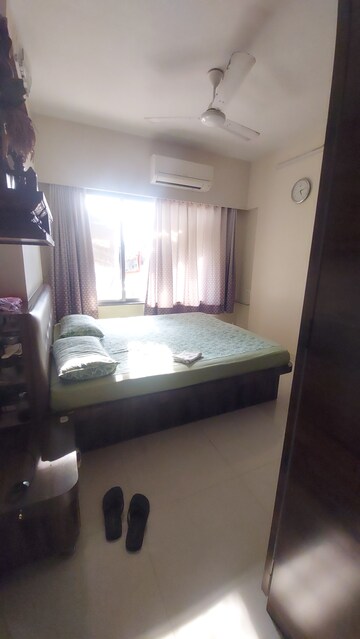 Master Bedroom in 2 BHK Apartment at Shree Niketan, Kandivali West – for Sale