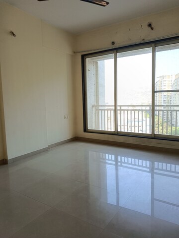 Living Room in 1 BHK Apartment at Borivali East – for Sale