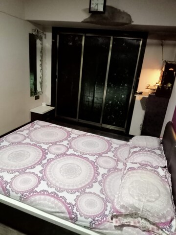 Bedroom in 2 BHK Apartment at Swapna Sangeet CHS, Mulund West – for Sale
