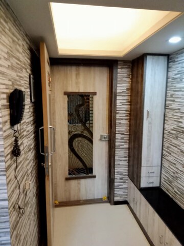 Bedroom in 2 BHK Apartment at Swapna Sangeet CHS, Mulund West – for Sale