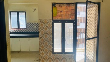 Room in 2.5 BHK Apartment at Charms Castle, Raj Nagar Extension – for Sale