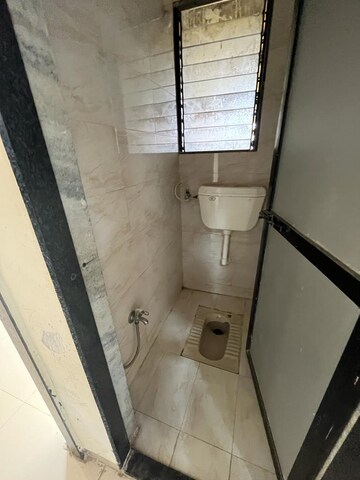 Bathroom in 1 BHK Apartment at Navkar Tower Part 1, Naigaon East – for Sale
