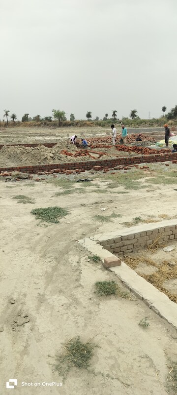 Plot Area in  Plot at Bhopani Village – for Sale