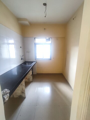 Kitchen in 1 BHK Apartment at Vihang Valley Phase 2, Kasarvadavali – for Sale