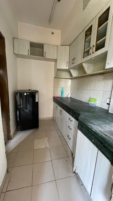 Kitchen in 2.5 BHK Apartment at Paras Tierea, Sector 137 – for Sale