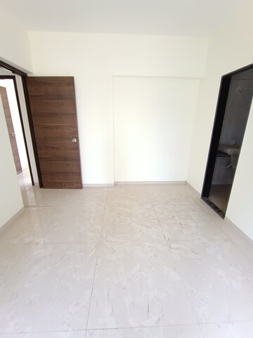 Room in 2 BHK Apartment at Navkar Happy Homes, Borivali West – for Sale