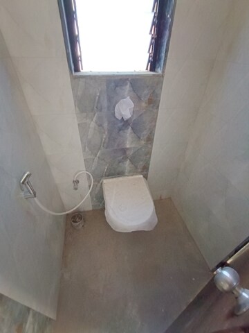 Bathroom in 2 BHK Apartment at Navkar Happy Homes, Borivali West – for Sale