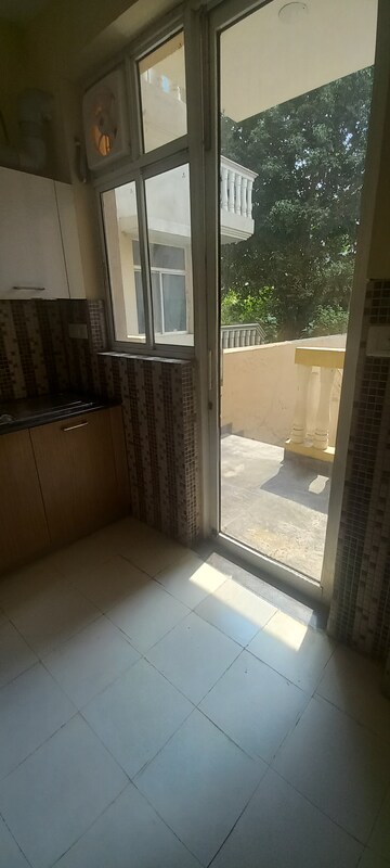 Kitchen in 4 BHK Apartment at Ansal API Esencia, Sector 67 – for Sale