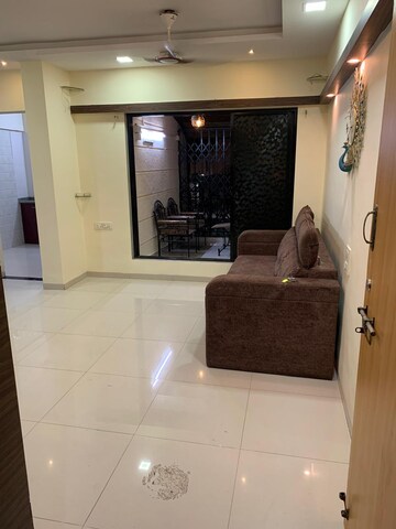Living Room in 1 BHK Apartment at Cosmos Orchid, Ghodbunder Road – for Sale