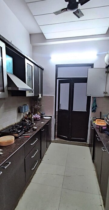 Kitchen in 4 BHK Builder Floor at Raj Bagh – for Sale