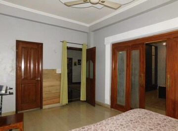 Bedroom in 4 BHK Builder Floor at Raj Bagh – for Sale