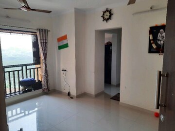 Living Room in 1 BHK Apartment at Raunak Heights, Ghodbunder Road – for Sale