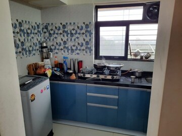 Kitchen in 1 BHK Apartment at Raunak Heights, Ghodbunder Road – for Sale