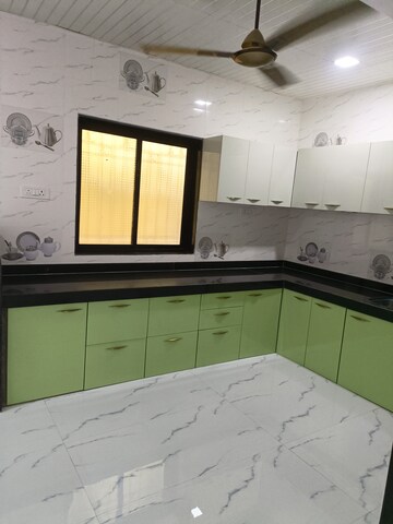Kitchen in 5 BHK Villa at Pushpanjali Heights, Owale – for Sale