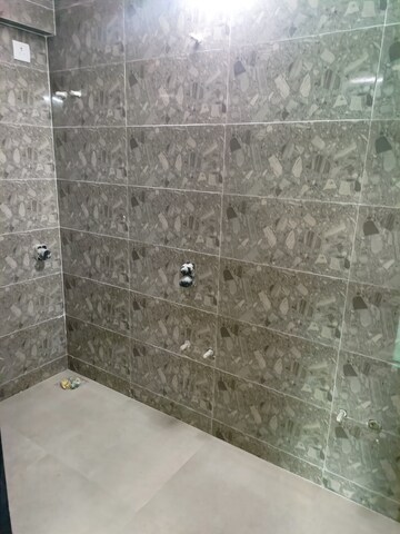 Bathroom in 1 BHK Apartment at Cosmos Orchid, Ghodbunder Road – for Sale