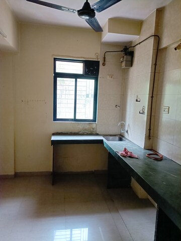 Kitchen in 1 BHK Apartment at Vihang Valley Phase1, Kasarvadavali – for Sale
