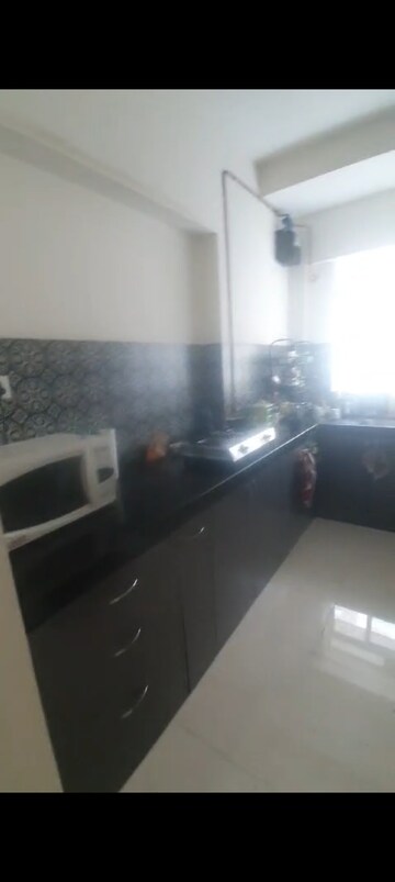 Kitchen in 2 BHK Apartment at Lodha Amara, Kolshet Road – for Sale