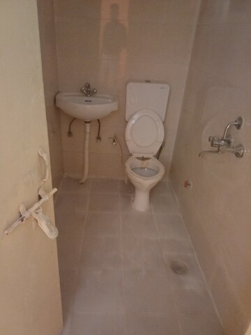 Bathroom in 3 BHK Apartment at Adore Happy Homes Grand, Sector 85 – for Sale