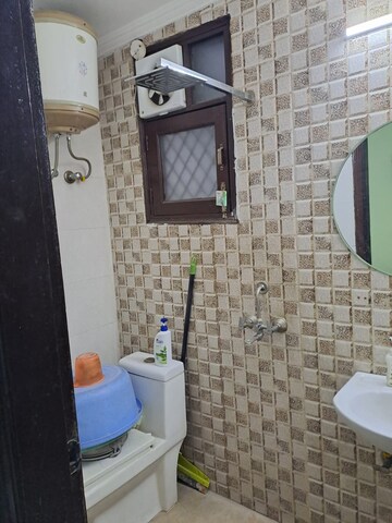 Bathroom in 2 BHK Builder Floor at Chattarpur – for Sale
