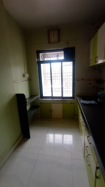 Kitchen in 2 BHK Apartment at Dombivli West – for Sale