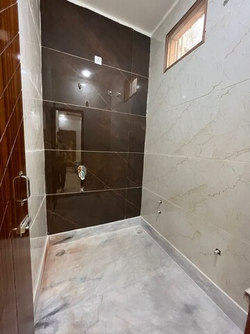 Bathroom in 4 BHK Apartment at Madhav Puram – for Sale