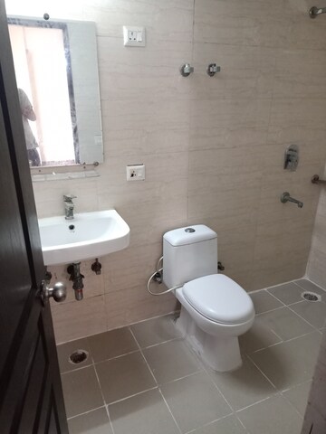 Bathroom in 2.5 BHK Apartment at Amrapali Princely Estate, Sector 76 – for Sale