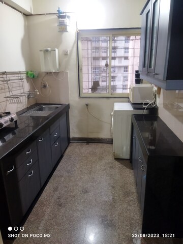 Kitchen in 1 BHK Apartment at Gundecha Sunflower, Kandivali East – for Sale