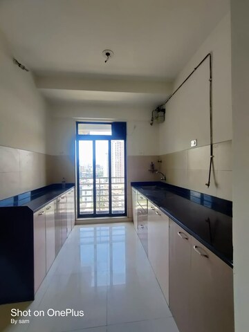 Kitchen in 2 BHK Apartment at Coral Heights, Kavesar – for Sale