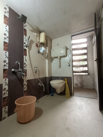 Bathroom in 2 BHK Apartment at Parsik Nagar – for Sale